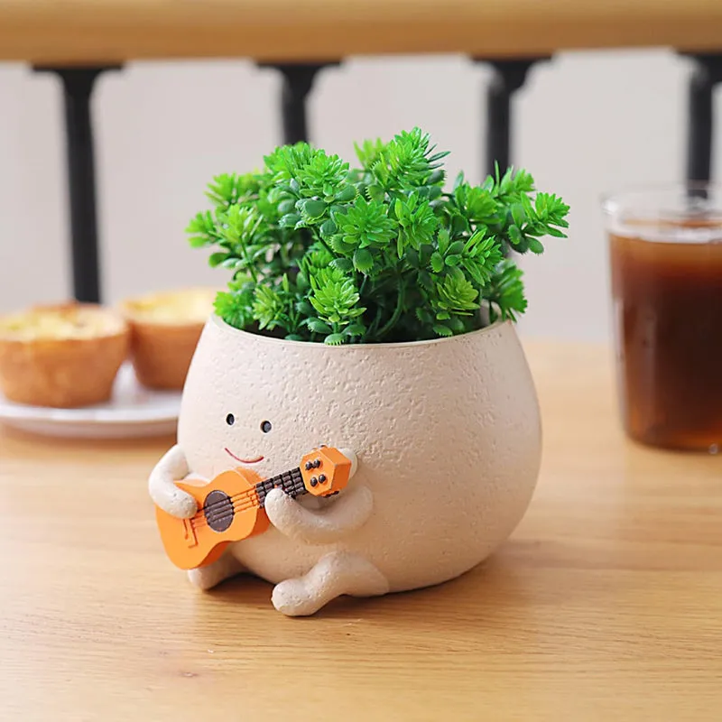 Guitarist Resin Planter media 6
