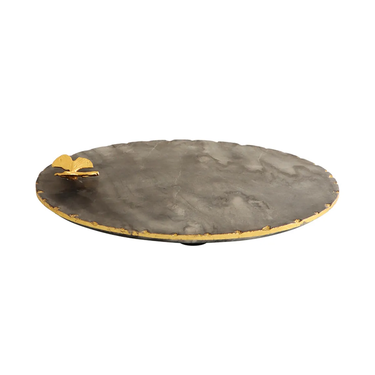 Side view of a low black marble platter with gold edging and butterfly detail