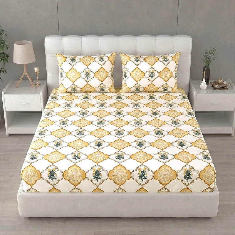 Front view of yellow and off-white printed bedsheet with two pillow covers