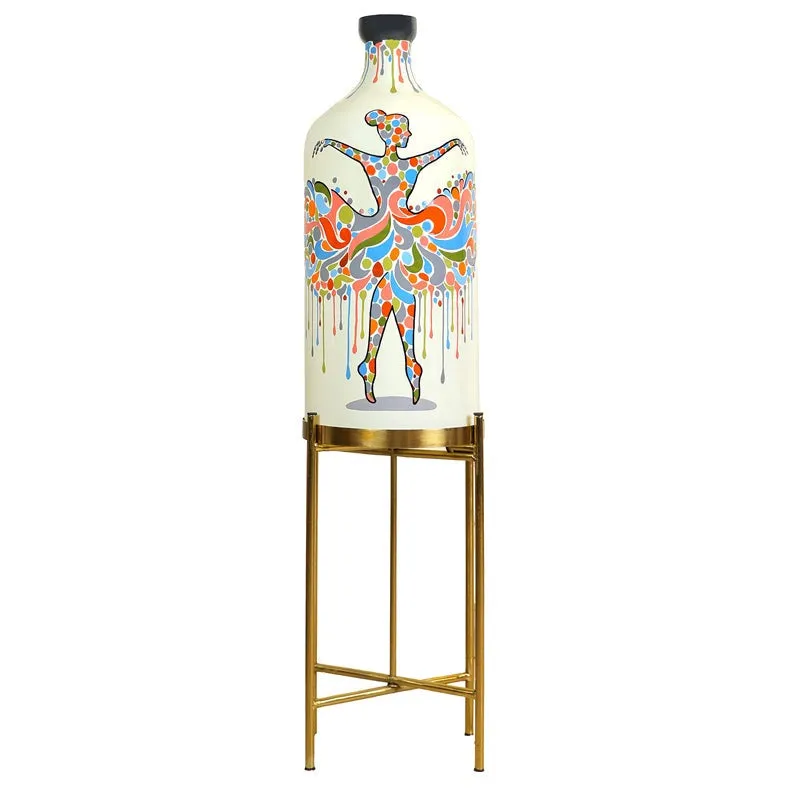 Front view of hand-painted glass floor lamp on tall metal stand