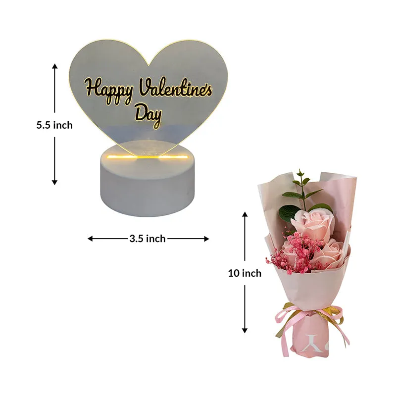 Heart-shaped Valentine's showpiece beside a pink rose arrangement with dimension arrows.