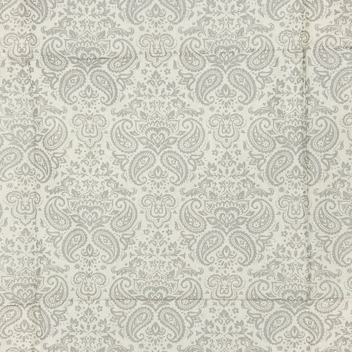 Close-up of grey paisley pattern on fabric