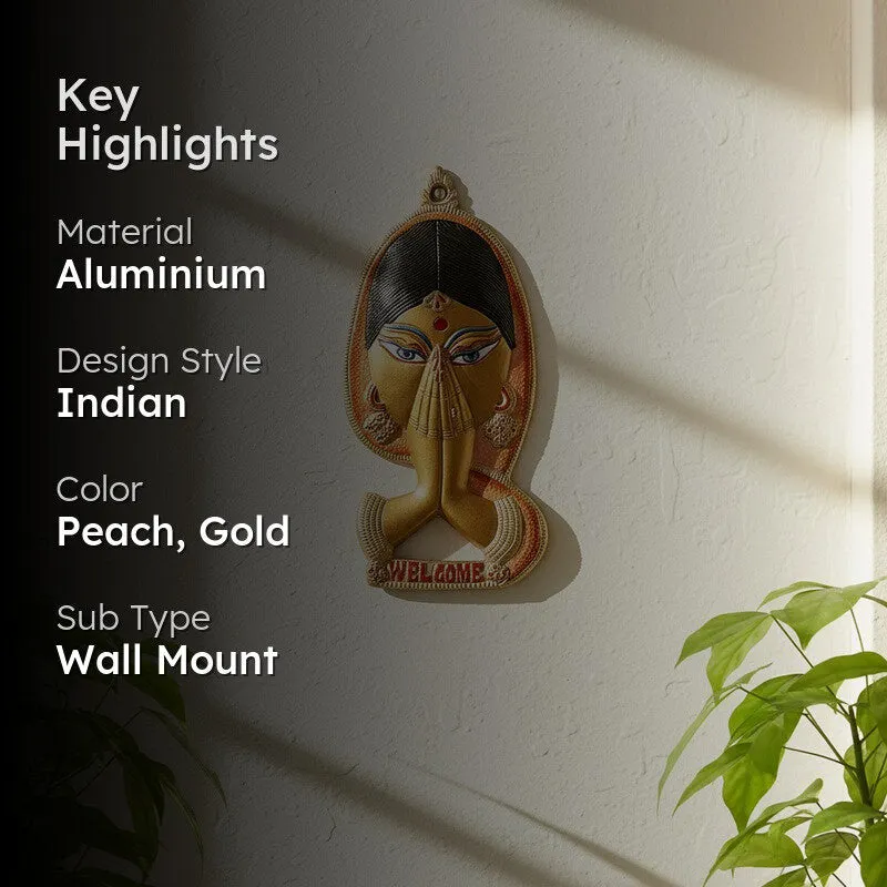 Peach and gold Indian-style wall accent displayed in a living room setting