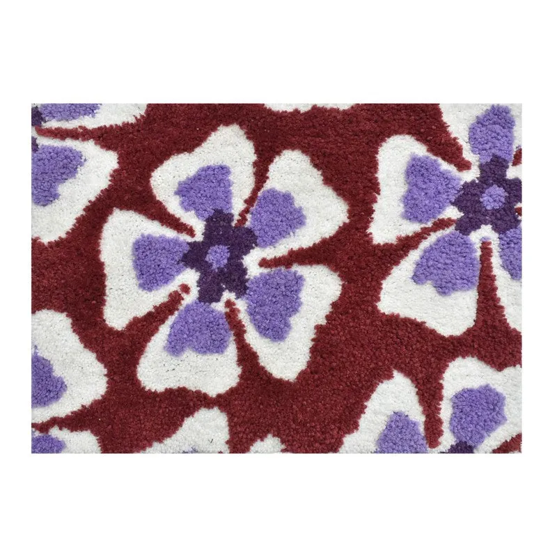 Close-up of the textured floral pattern on the bath mat