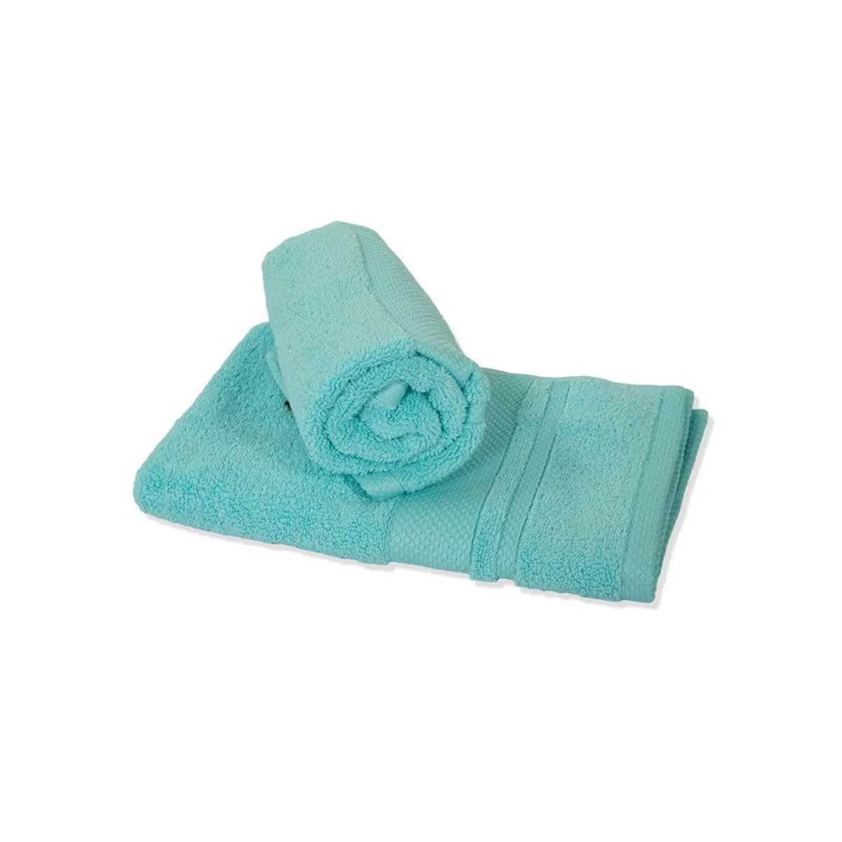 Rolled and folded turquoise plush towels arranged on a white background