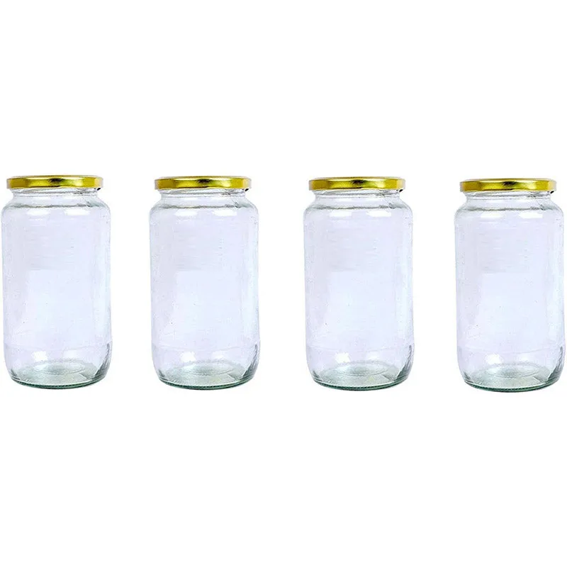 Four transparent glass storage jars arranged in a row
