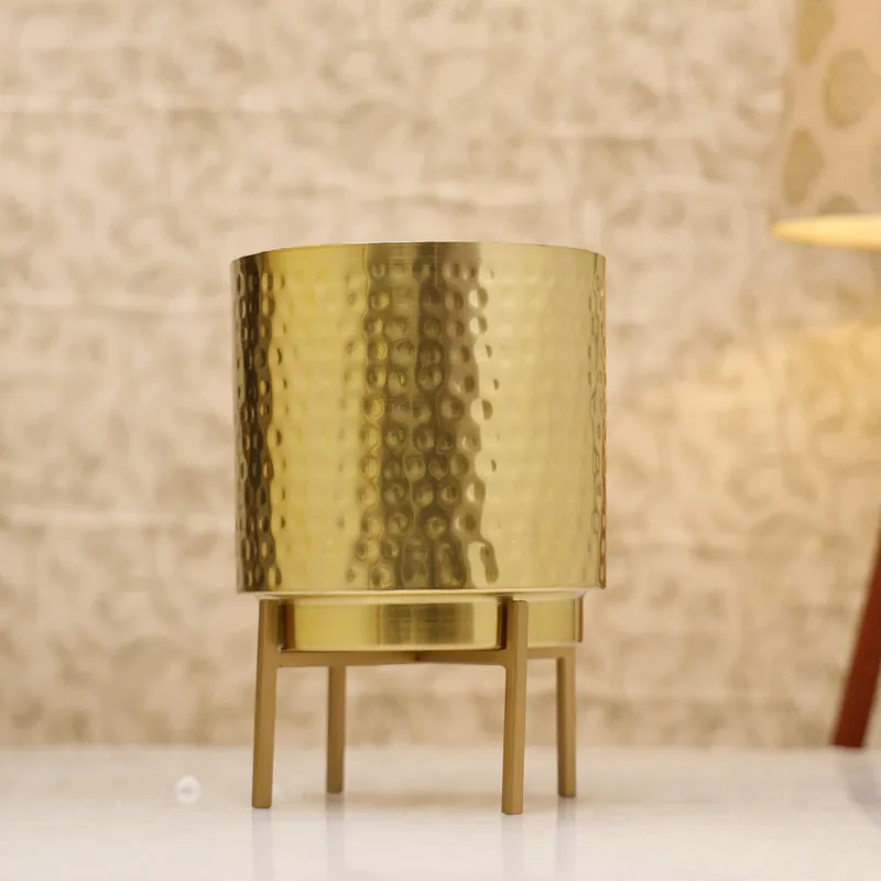 Gold hammered planter on a matching stand