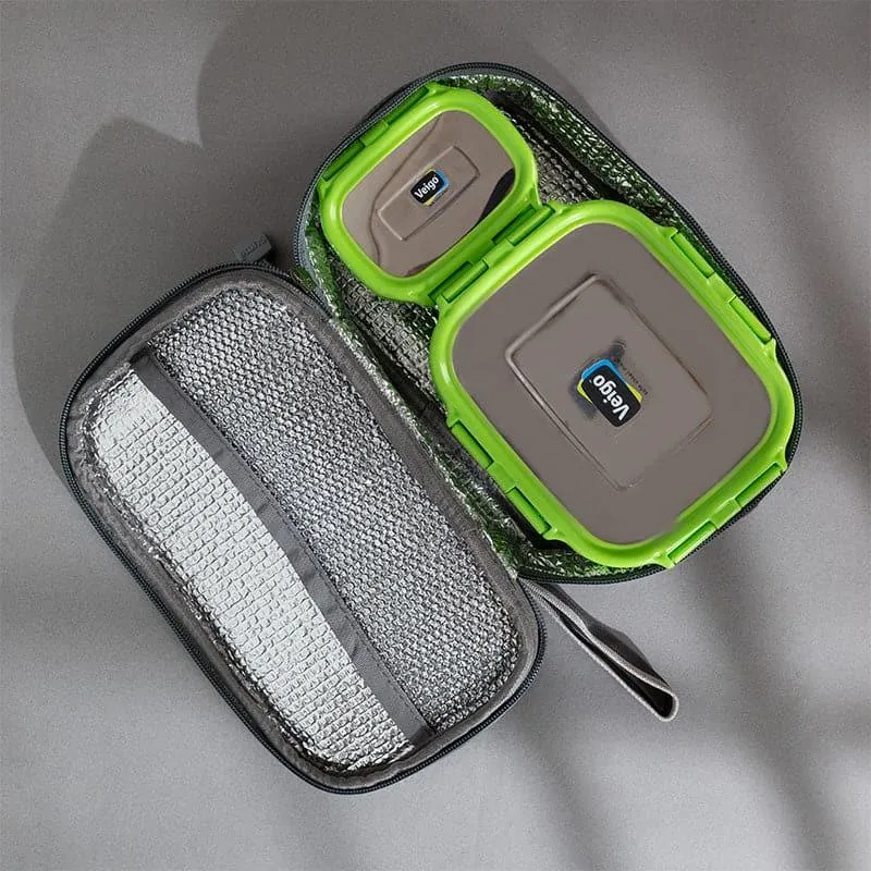 Open grey lunch pouch holding two green-lidded lunch boxes