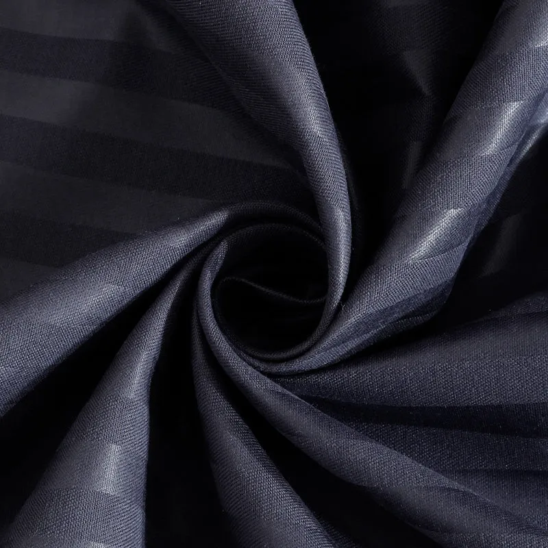 Close-up of midnight blue fabric with subtle stripe texture