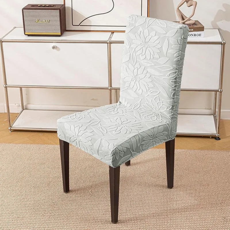 Single dining chair with a light grey floral fitted chair cover