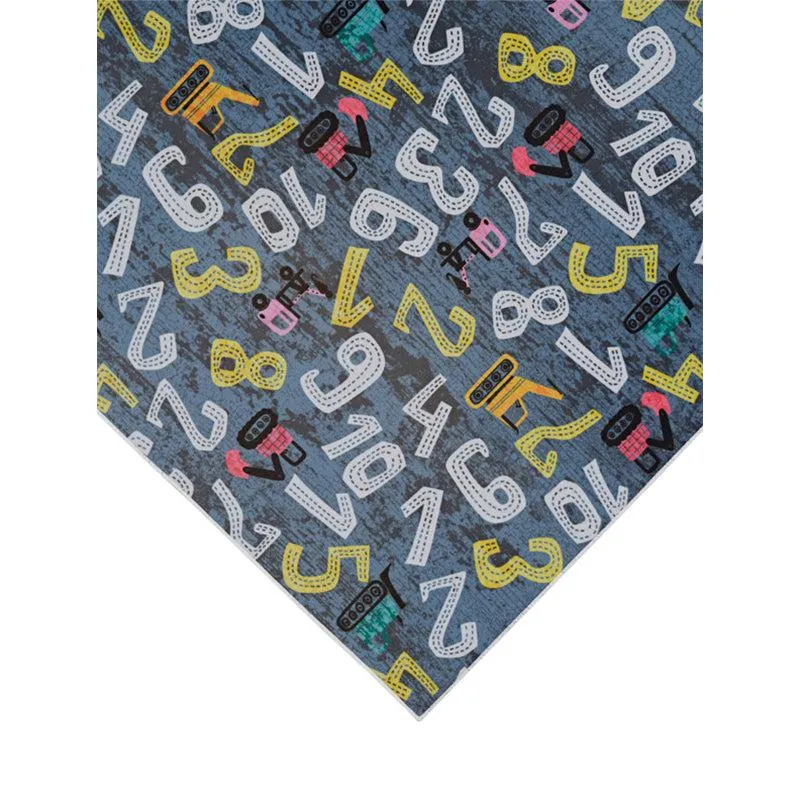 Corner view of grey carpet with scattered numbers and crane motifs