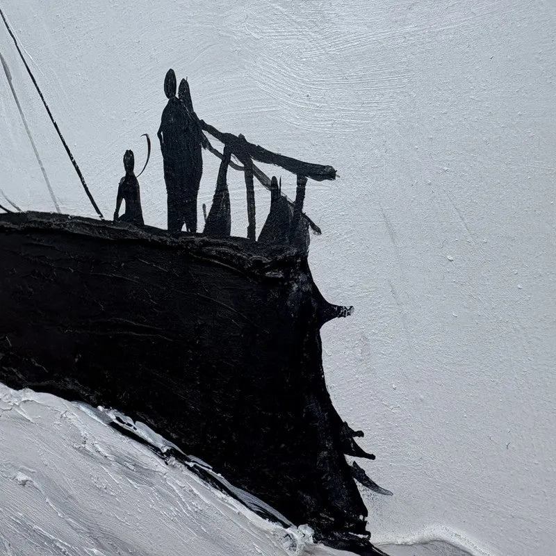 Close-up of the rear of the painted ship with figures in silhouette