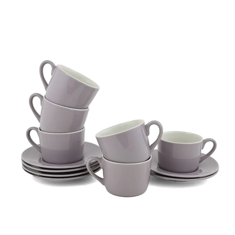 Six light purple cups with matching saucers on a white background