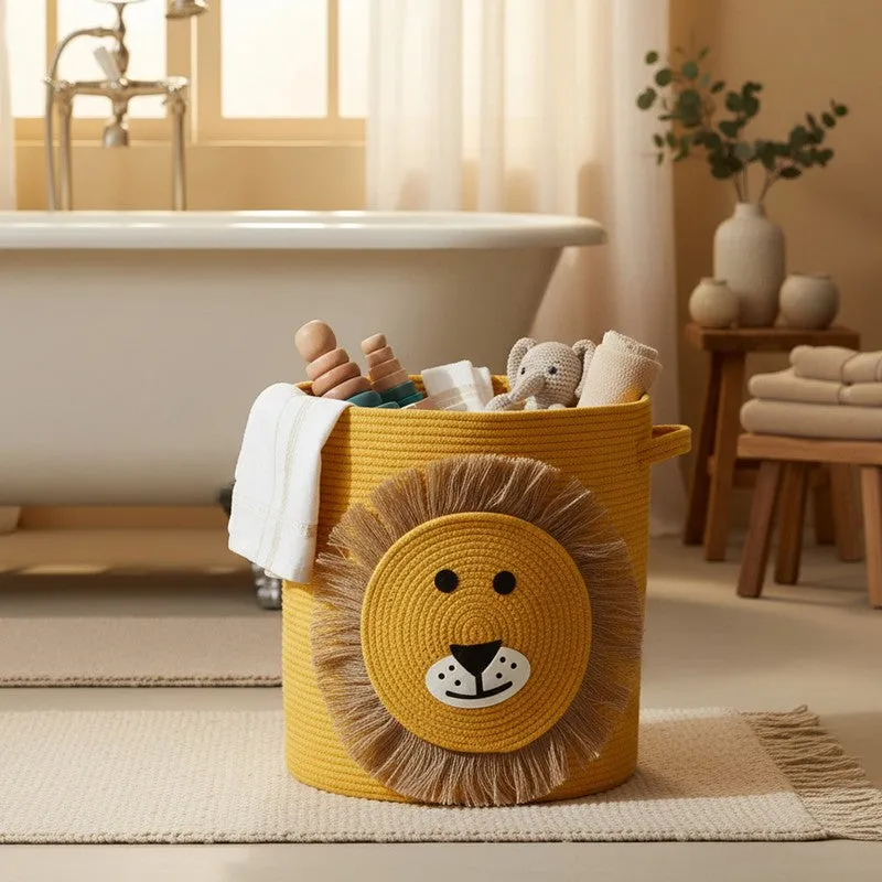Yellow lion motif storage basket holding toys and towels near a bathtub