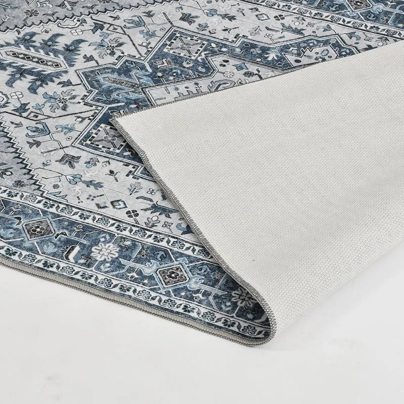 Close-up of blue and grey patterned carpet with underside shown