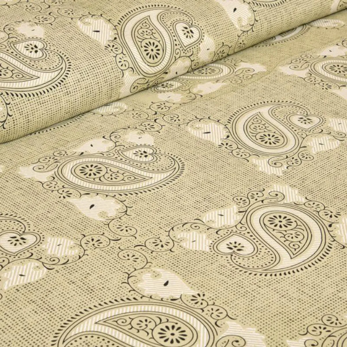 Close-up of yellow paisley cotton bedsheet with ornate floral motifs