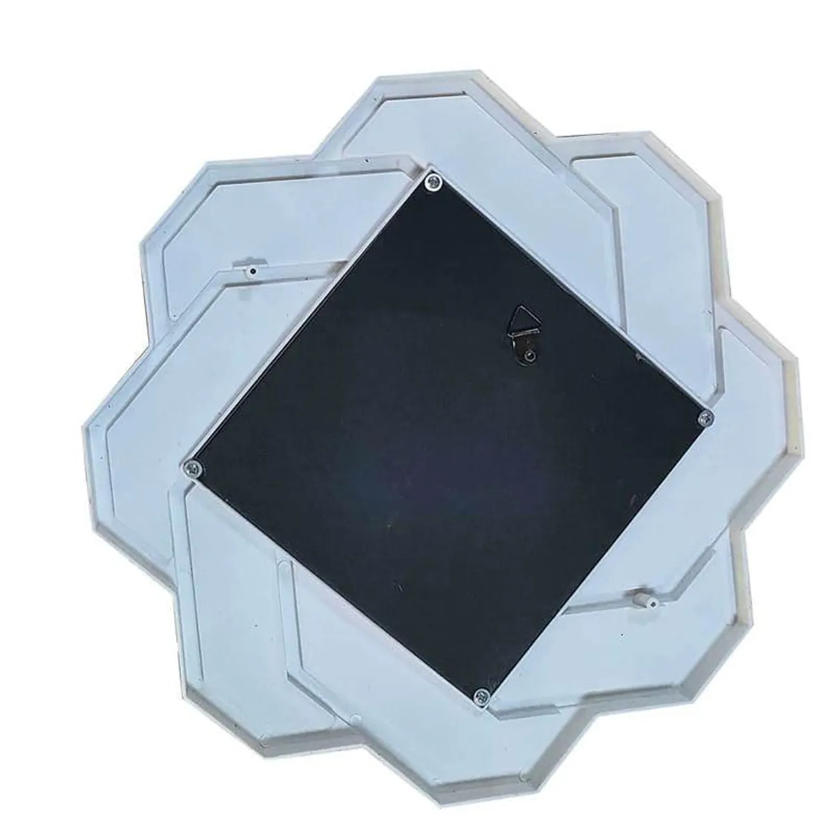 Back view of a white decorative wall mirror with wall-mount hook