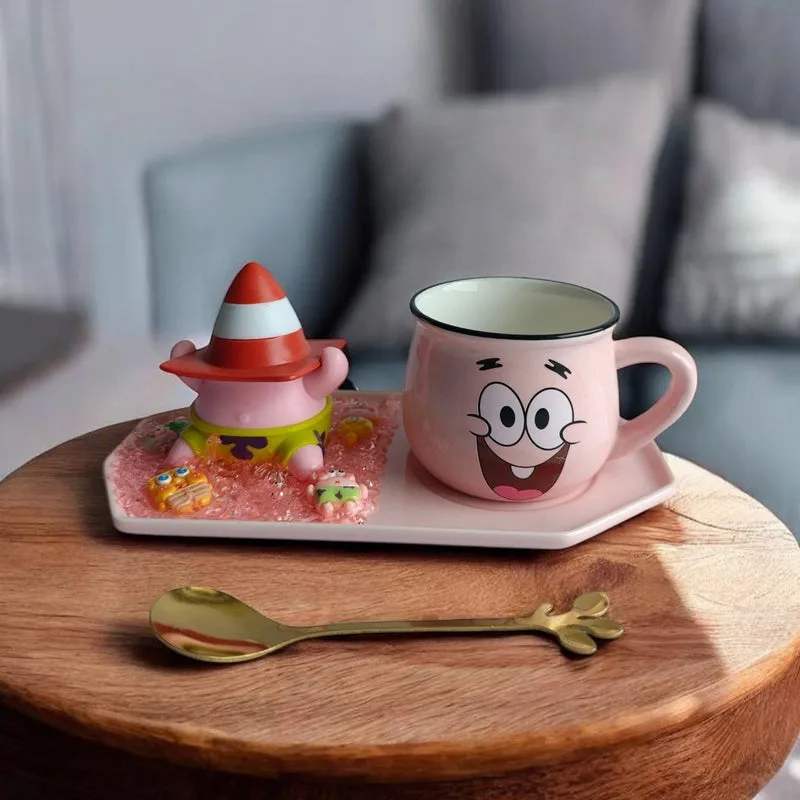 Pink character mug and figurine arranged on a matching tray