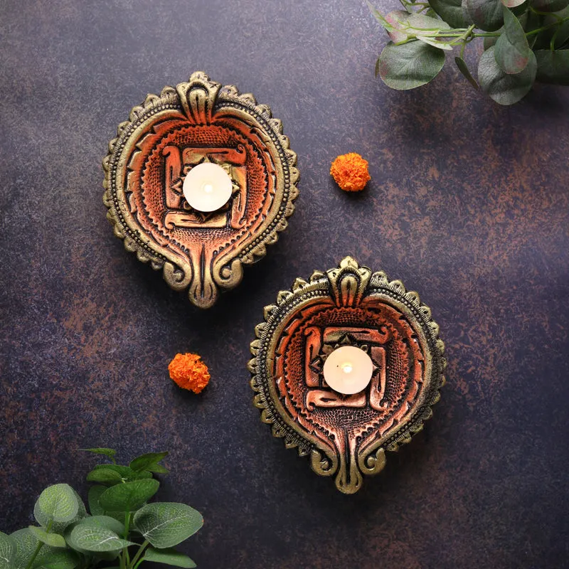 Divine Swastika Terracotta Diya - Set Of Two media 1
