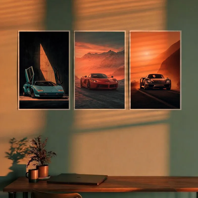 Set of three racing car wall posters displayed above a desk