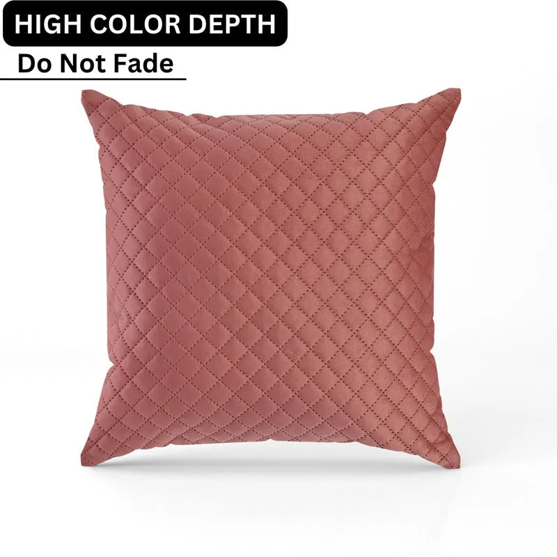 Close-up view of the pink quilted velvet surface