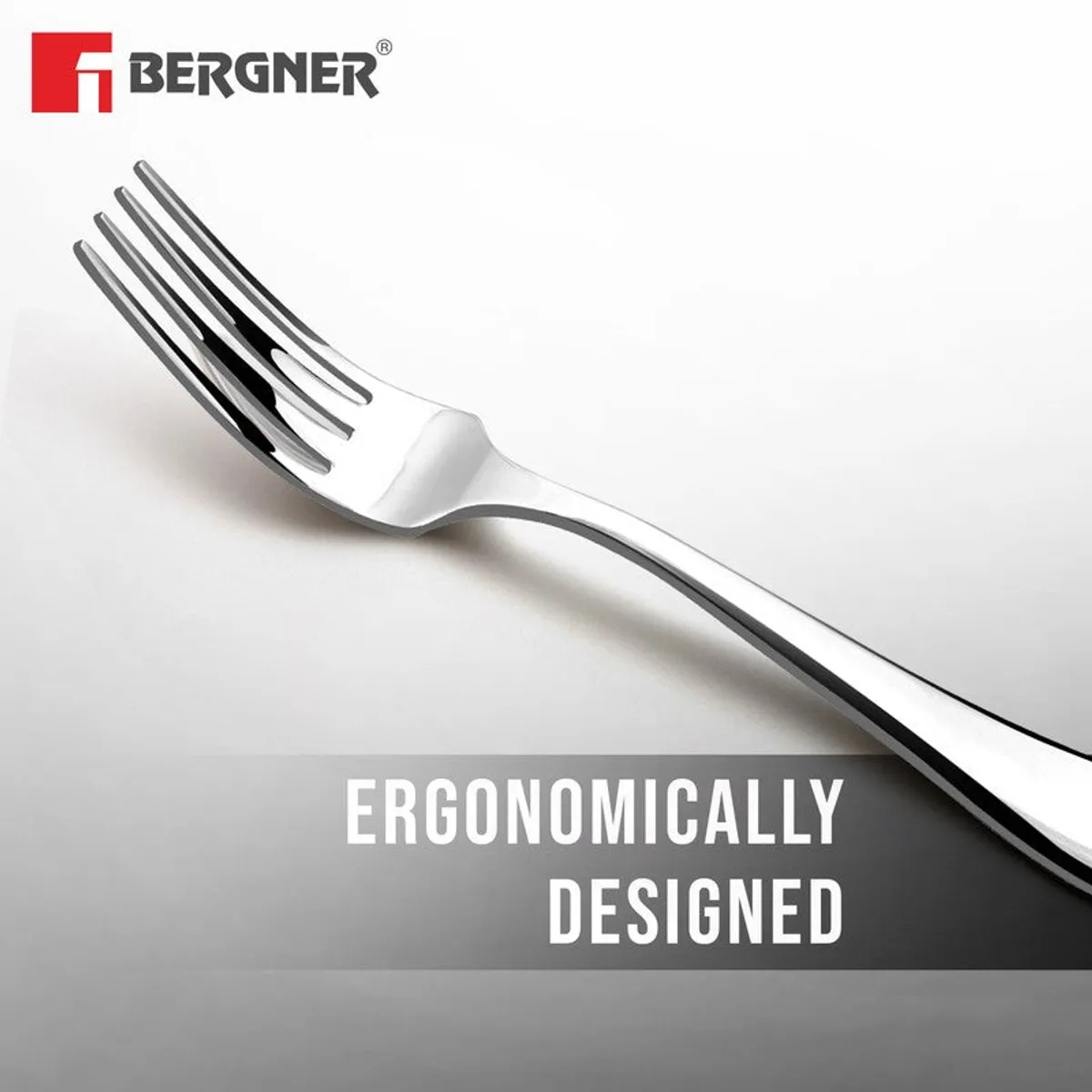 Close-up of a single silver fork showing its smooth, curved handle.