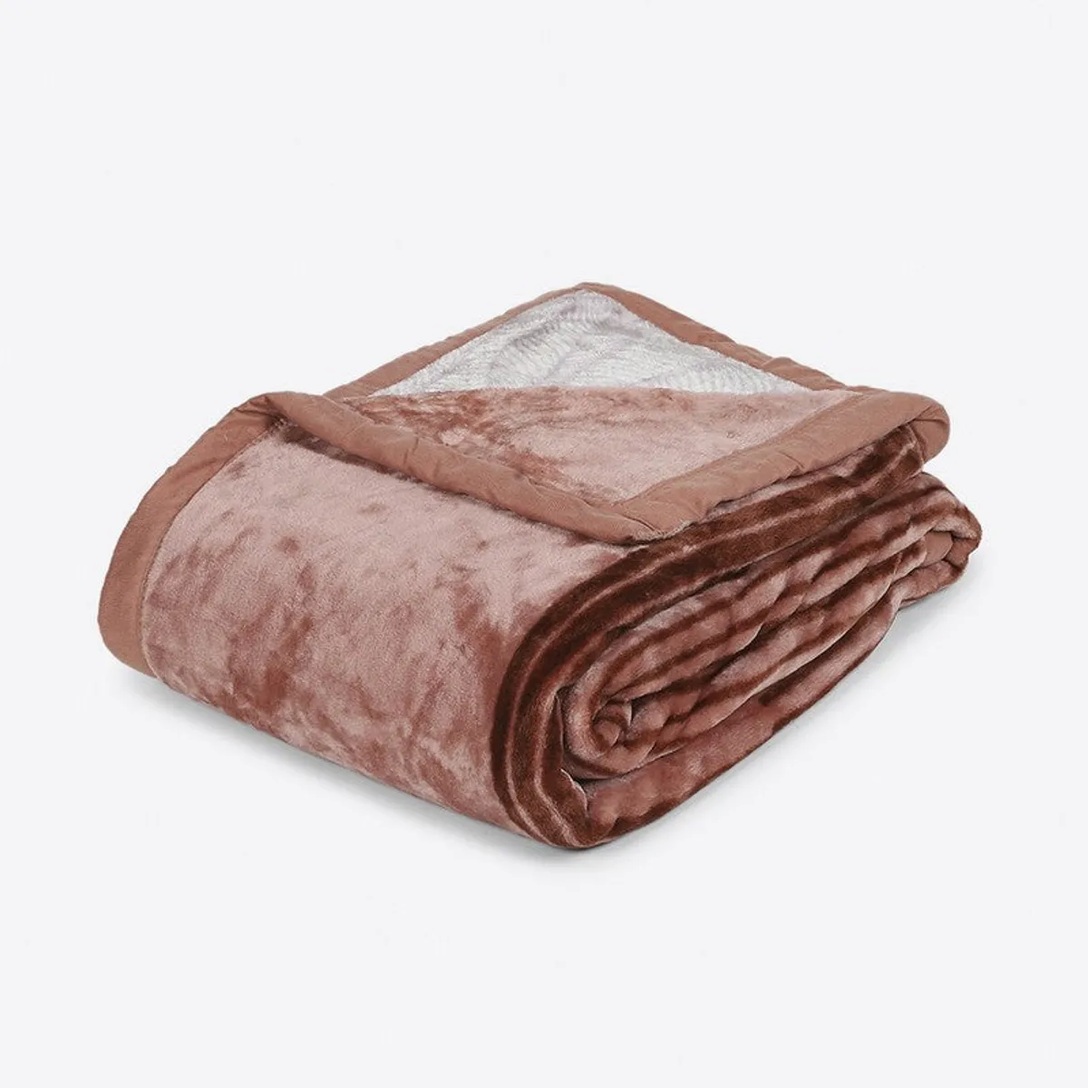 Folded brown and cream blanket showing its abstract printed design
