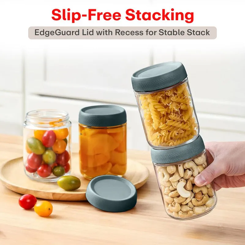 Two jars stacked with green-toned tops, showing a stable stacking arrangement.