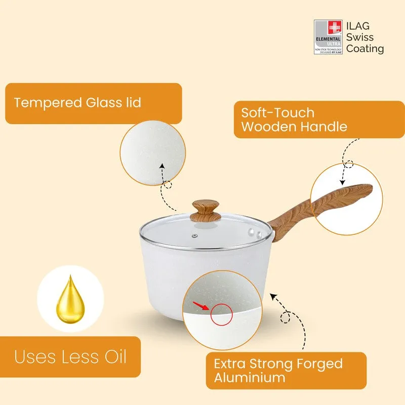 White saucepan showing glass lid, wood-look handle and speckled finish