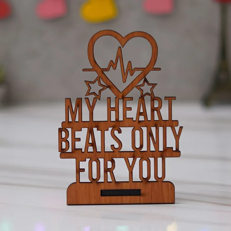 Wooden tabletop plaque with heart motif and romantic message
