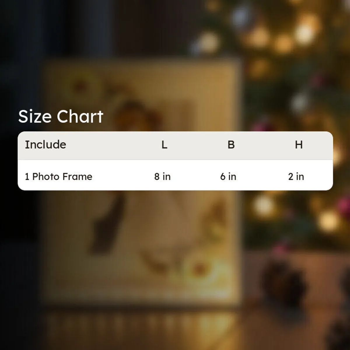 White photo frame shown with a size chart on a softly blurred background.