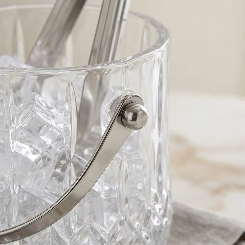 Close-up of the glass ice bucket with diamond-cut texture and metal handle