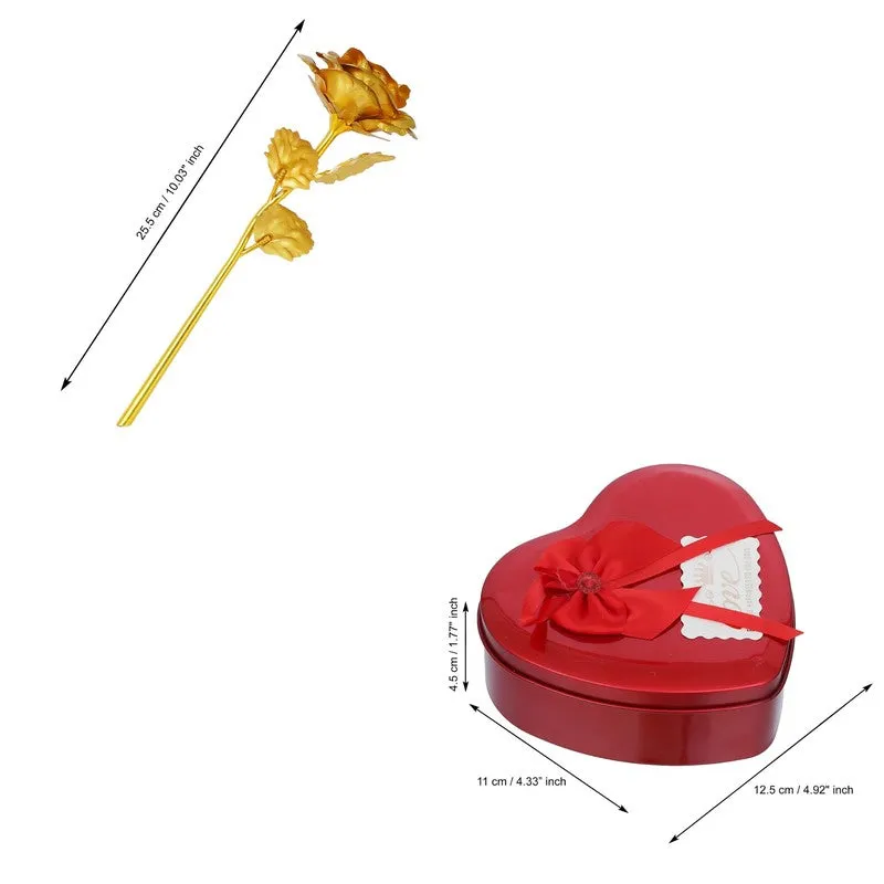 Gold rose stem and red heart-shaped gift box shown together