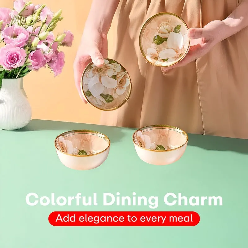 Floral ceramic bowls shown in hand and arranged on a pastel tabletop