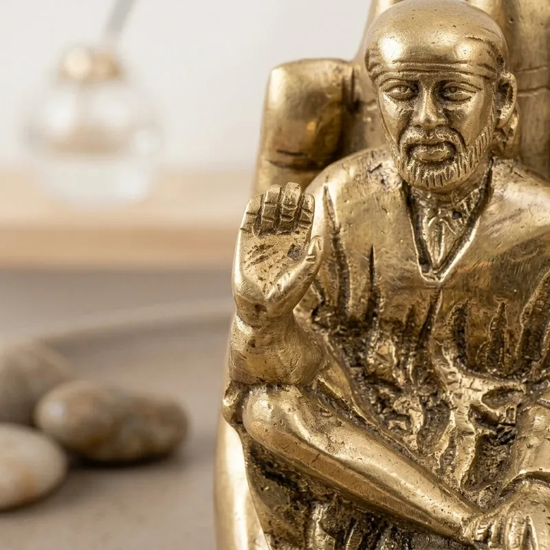Shiridhi Saibaba On Palm Brass Idol media 3
