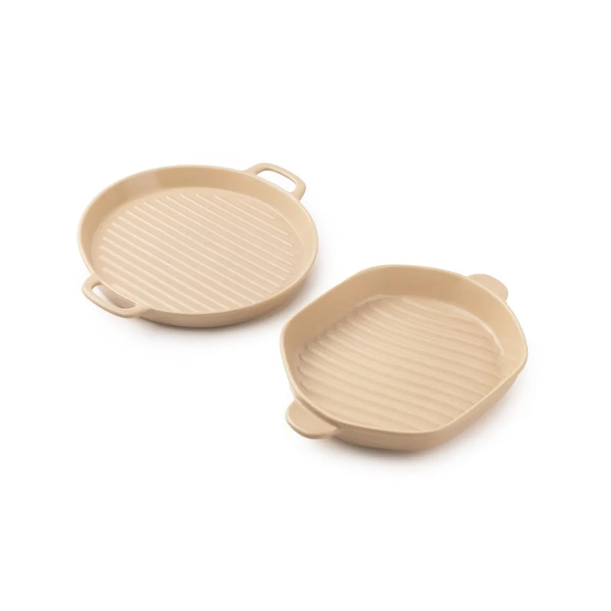 Two ivory ridged platters displayed against a white background