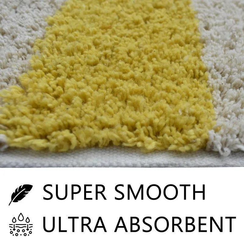 Close-up of the bath mat's soft yellow textured surface