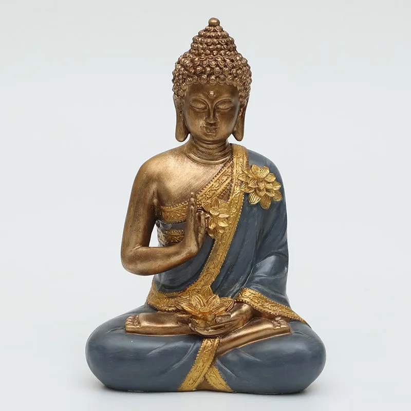 Studio front view of the Padma Gautama idol in grey and gold