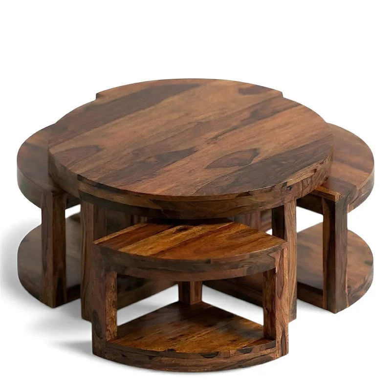 Round Sheesham wood center table with four curved stools nested below
