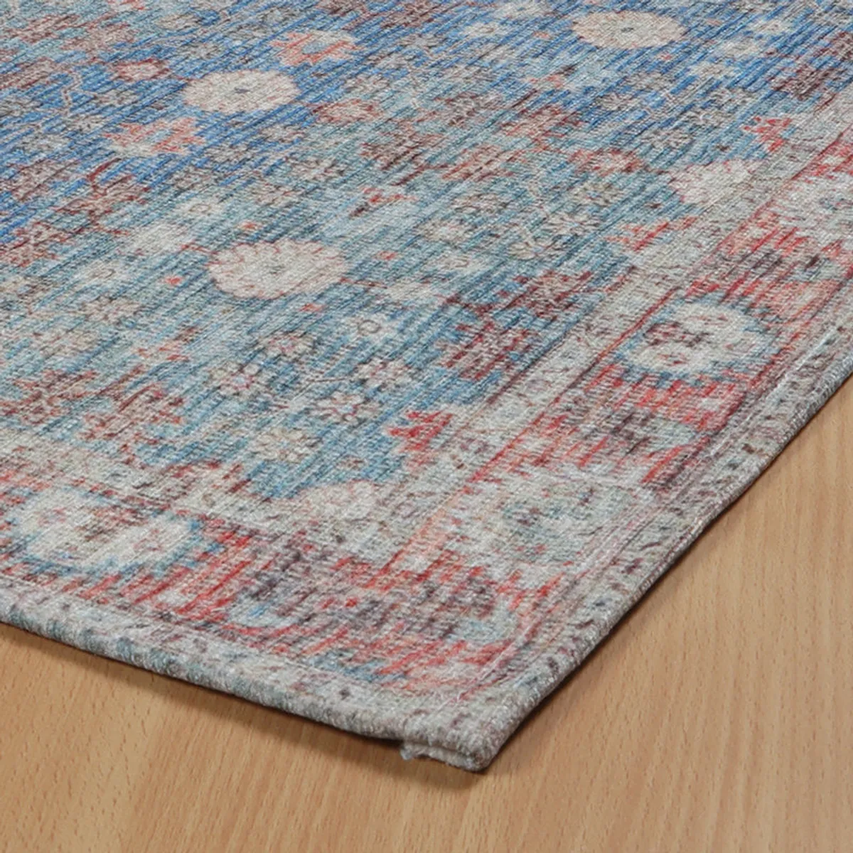 Close-up showing the mat's blue, brown and pale textured patterned surface.