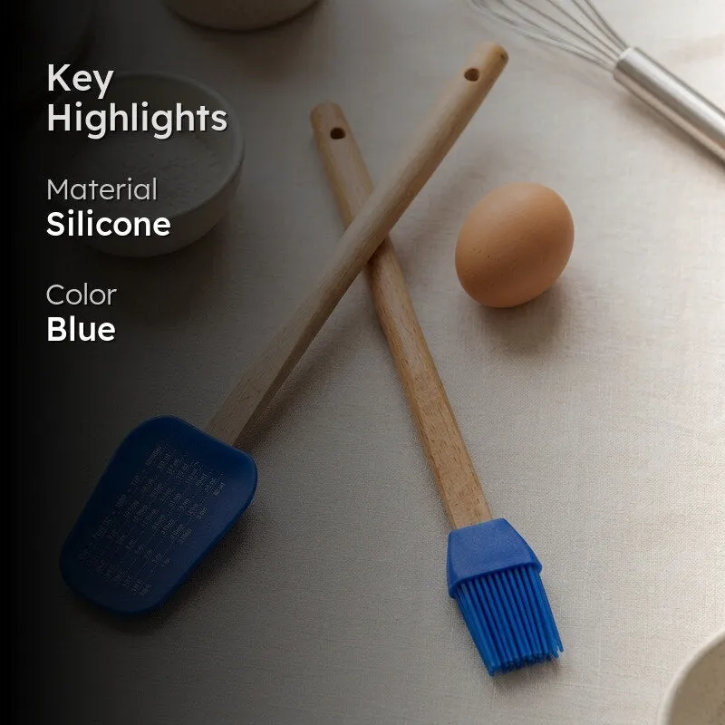 Blue silicone pastry brush and spatula with wooden handles with key highlights overlay