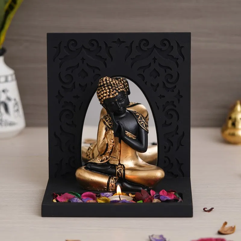 Black and gold Buddha tea light holder with decorative cutwork panel and candle space