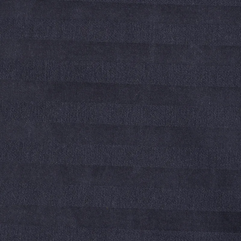 Detailed view of midnight blue fabric with self-striped texture