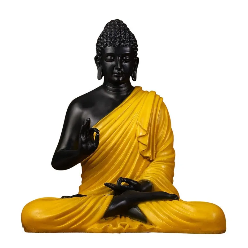 Black and yellow Buddha idol isolated on a white background