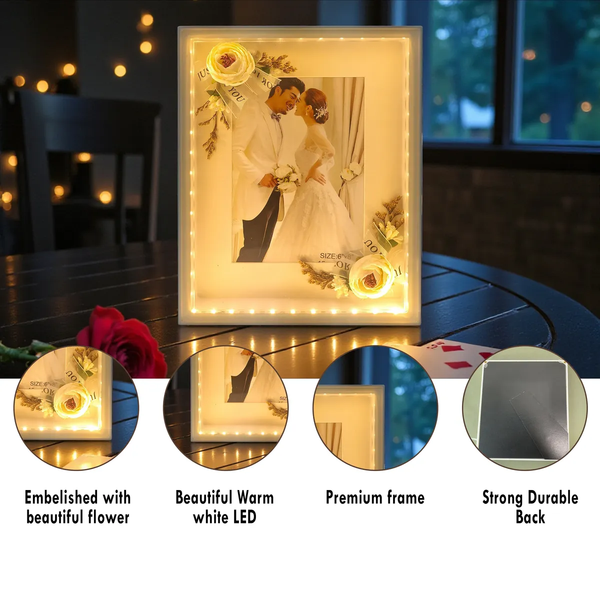 Glowing white photo frame displayed against a dark background.