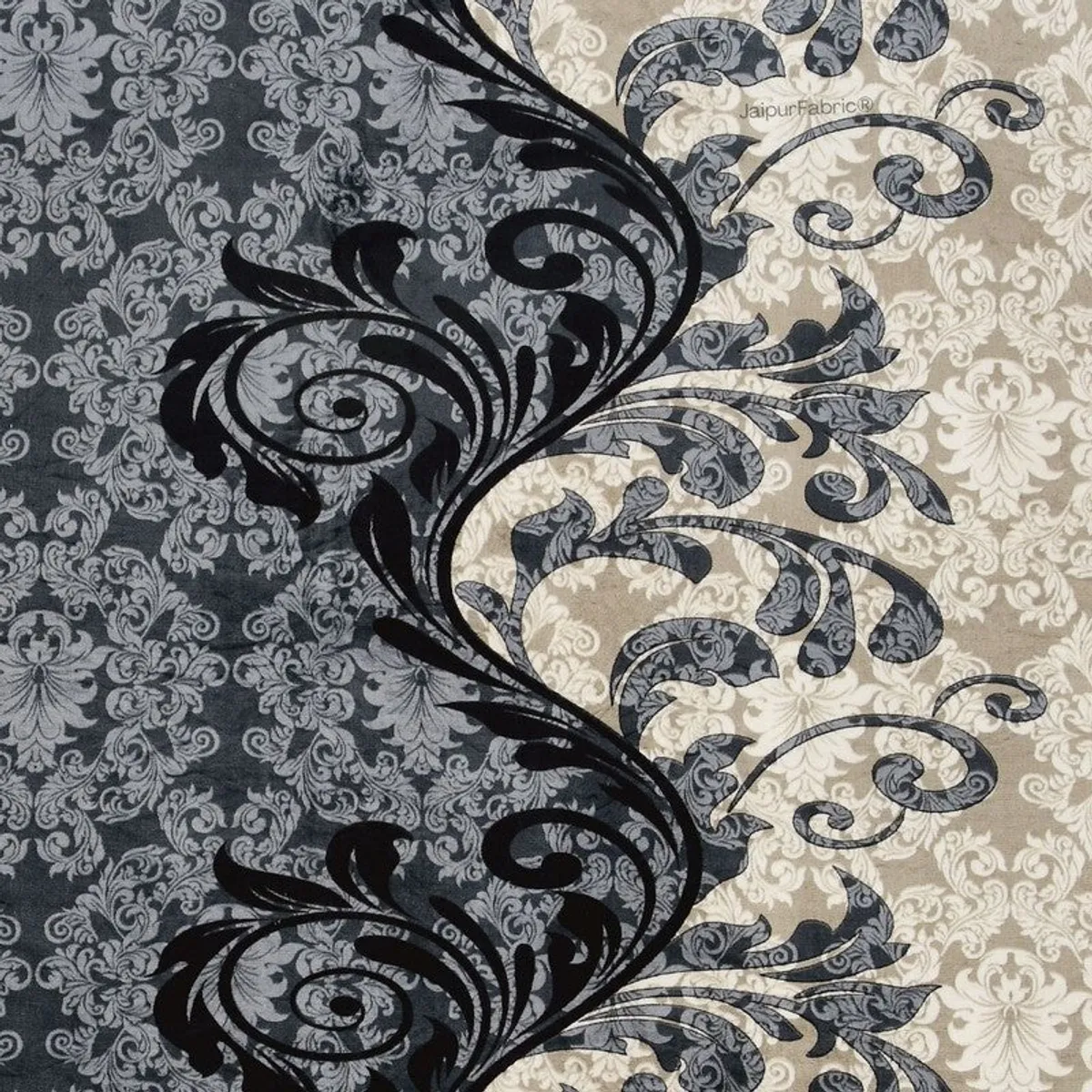 Close-up of ornate black, grey and beige floral bedsheet design