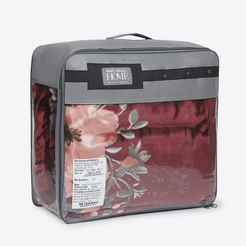 The folded blanket shown inside a transparent storage bag