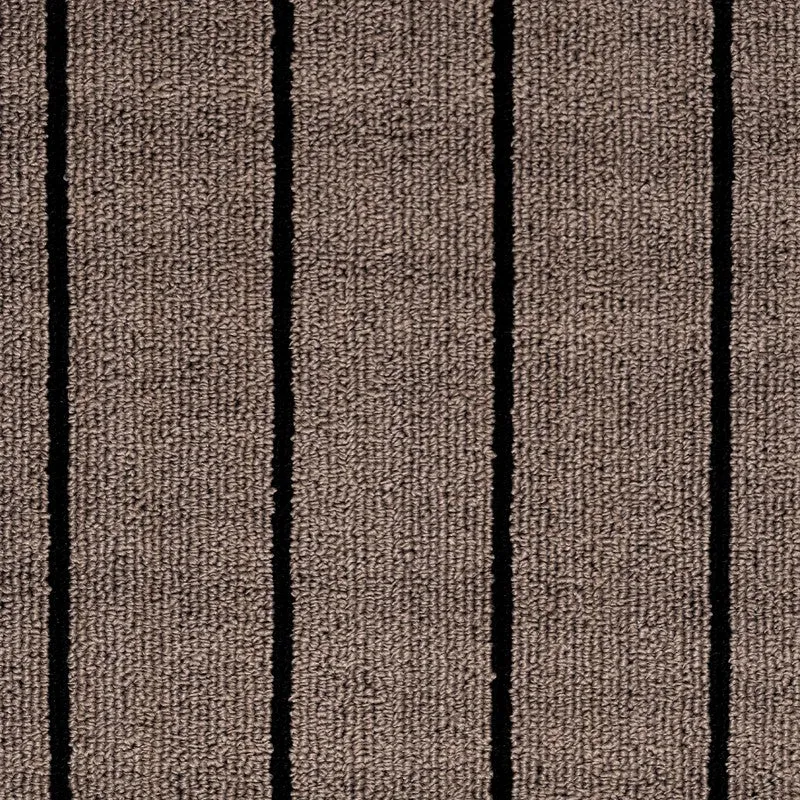 Close-up of the mats' textured beige surface and black stripes