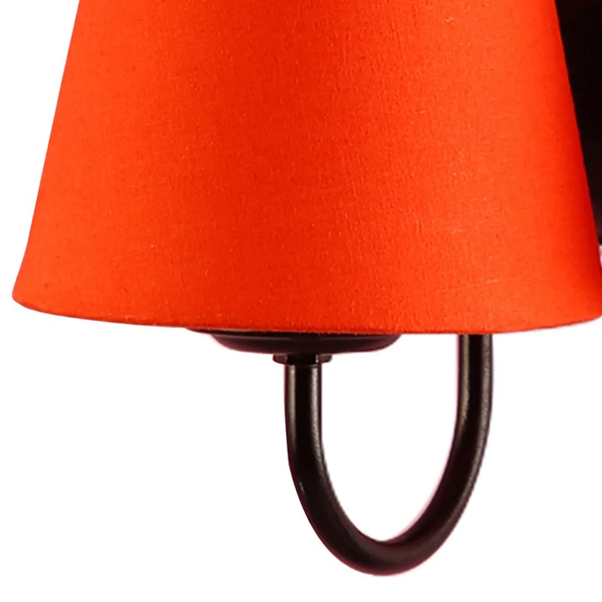 Close-up of orange cotton shade and curved black arm