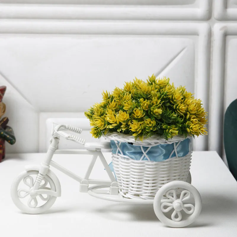 Faux Yellow Flower Plant On Mini Cycle Rikshaw media 1